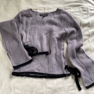 Sweater, size L, color light purple with black lining at bottom, runs small